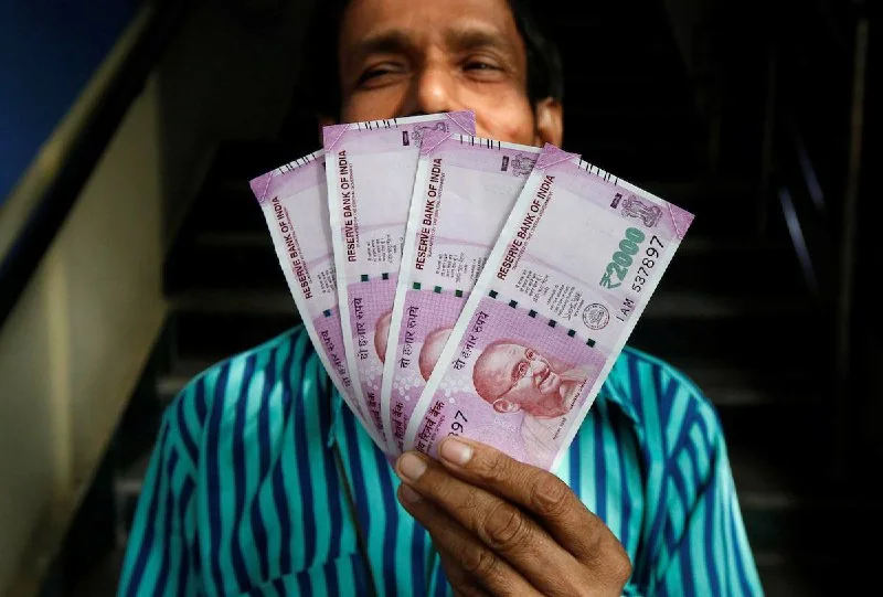 Rupee Hits Record Low as Markets Slide???The Indian Rupee plunged to a historic low of...